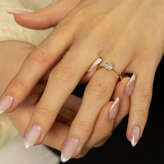 Illusjon ring til dame i gult gull med diamant 0,15 ct WP, str. 50-60