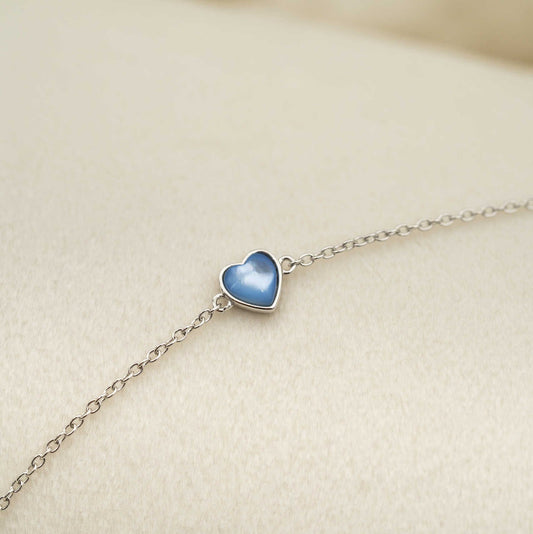 Armbånd i sølv med lys blå perle hjerte 25518 - Bjerveur.noArmbånd i sølv med lys blå perle hjerte 25518