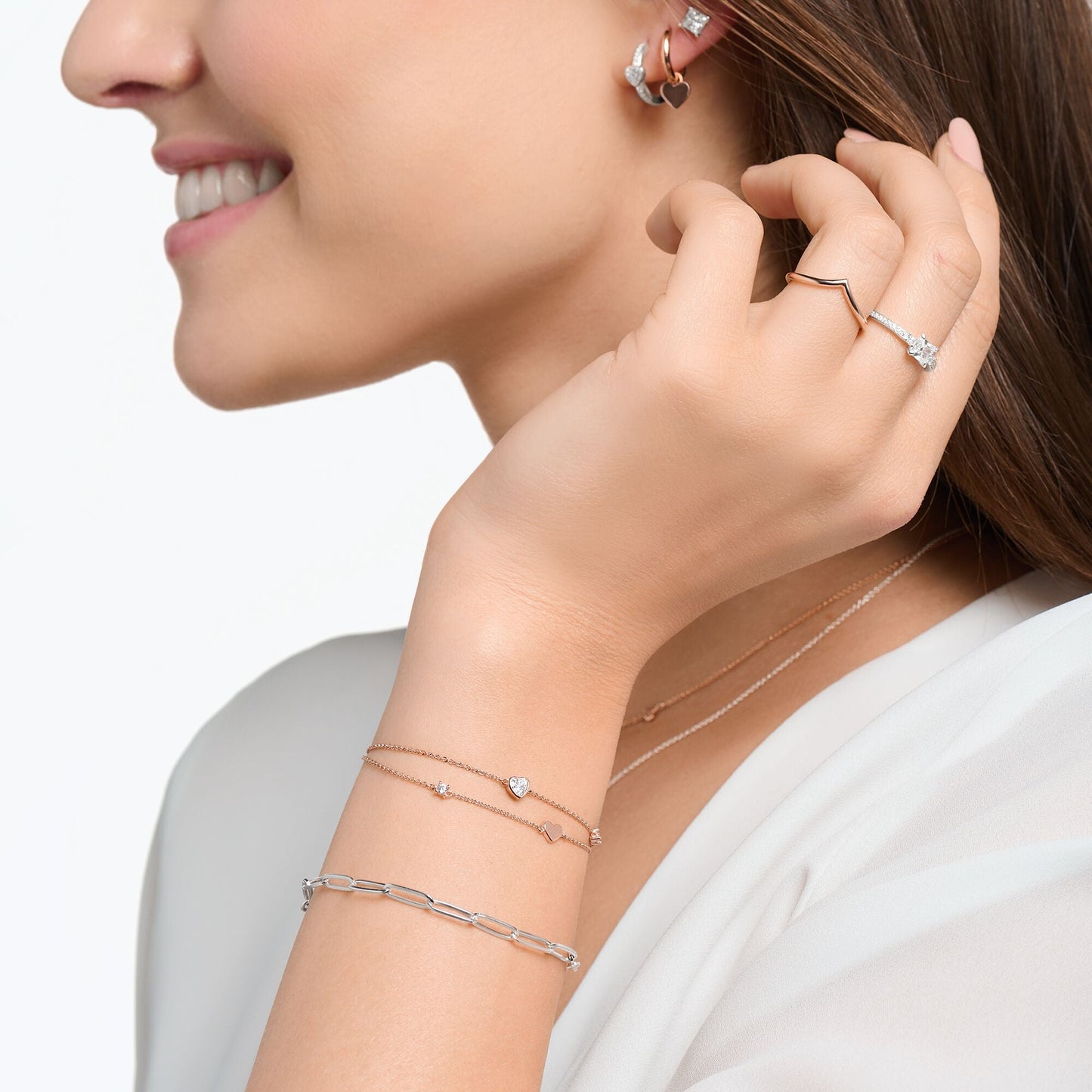 Armbånd med hjerter og hvite steiner i rosa gull A2057 - 416 - 14 - Bjerveur.noArmbånd med hjerter og hvite steiner i rosa gull A2057 - 416 - 14