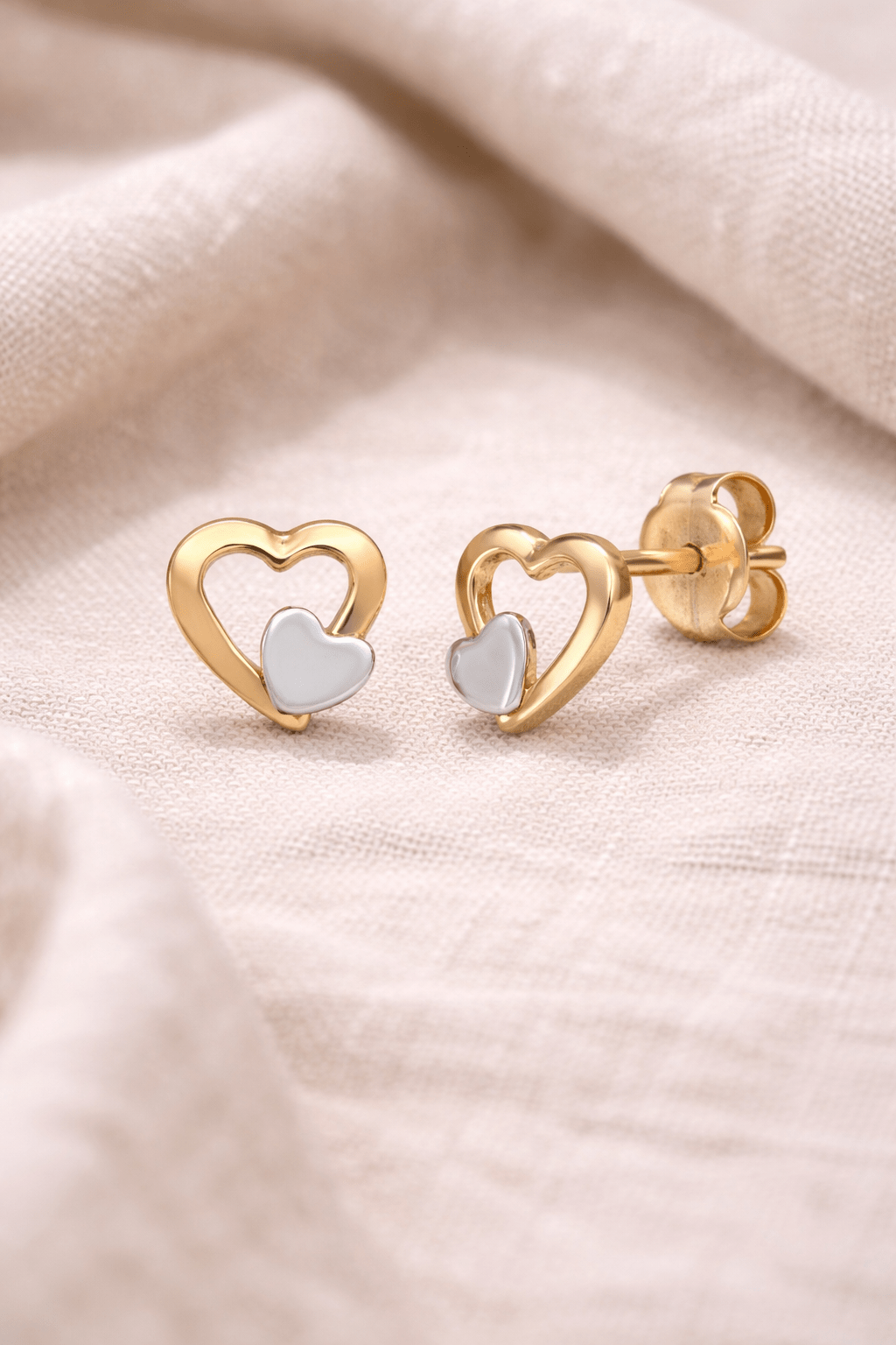 Hjerteformet ørepynt i 14K gull – et lite smykke med stor betydning - Bjerveur.no