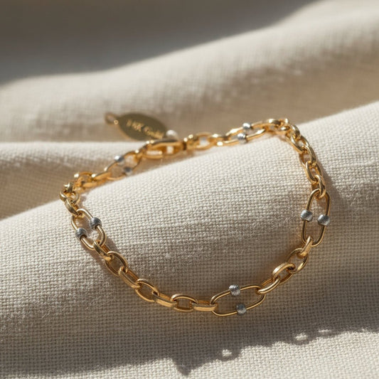 Tofarget armbånd i 14 karat gull - tidløs eleganse i hver lenke - Bjerveur.no