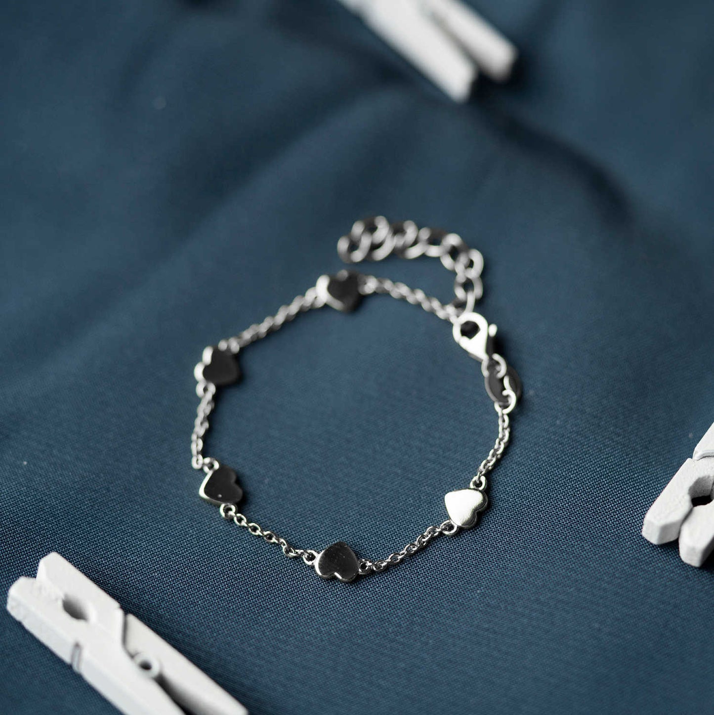ARMBÅND I SØLV HJERTER 25286