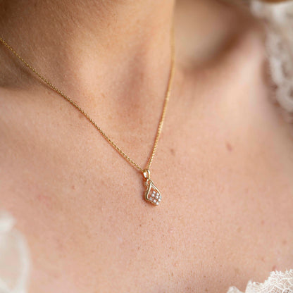 Anheng i 14 karat gult gull med 9 diamanter 0,08 ct, bilde 2 av 2
