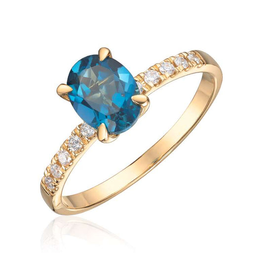 Ring i gult gull med oval london blue topaz og 0,12ct WSI diamanter på skinnen Artikkelnr: 57411