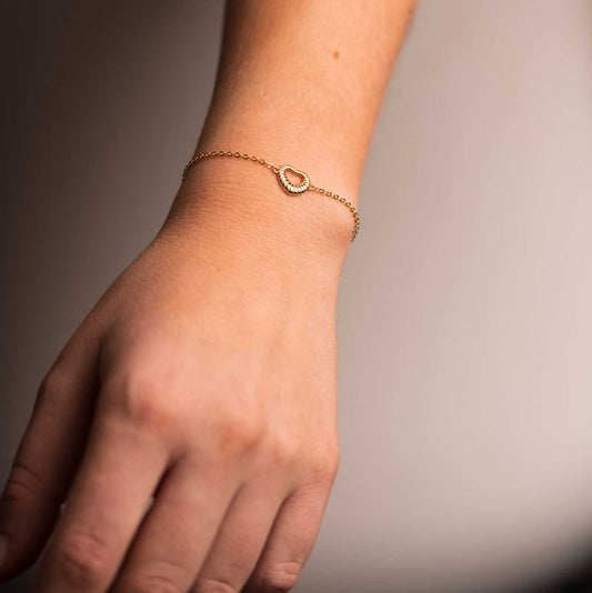 Hjerterille armbånd i sølv 992323